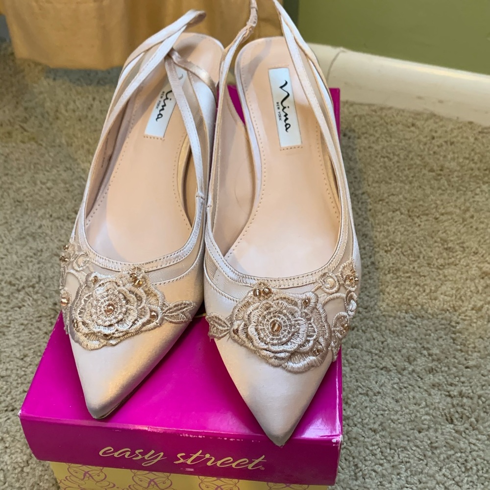 Nine light pink pumps size 8.5 worn once